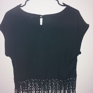 Black tassel blouse. Cute for a dinner date.